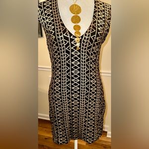 Never worn, sequin curve hugging dress